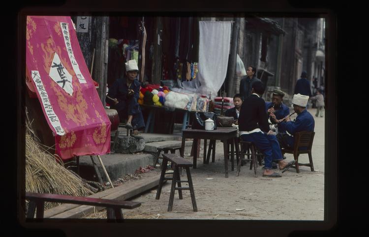 Image of 35mm slide: Ritual paraphernalia associated with death. Funeral banners and paper money. October 10th.