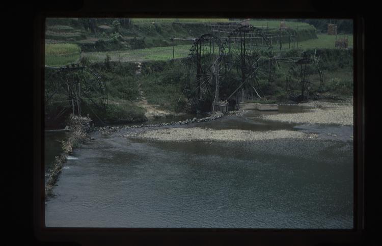 35mm slide: River with water wheel