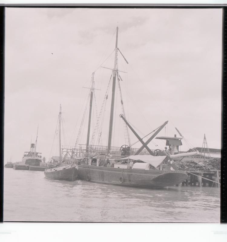 image of Black and white negative of Lucille M. Smith boat and other boats docked