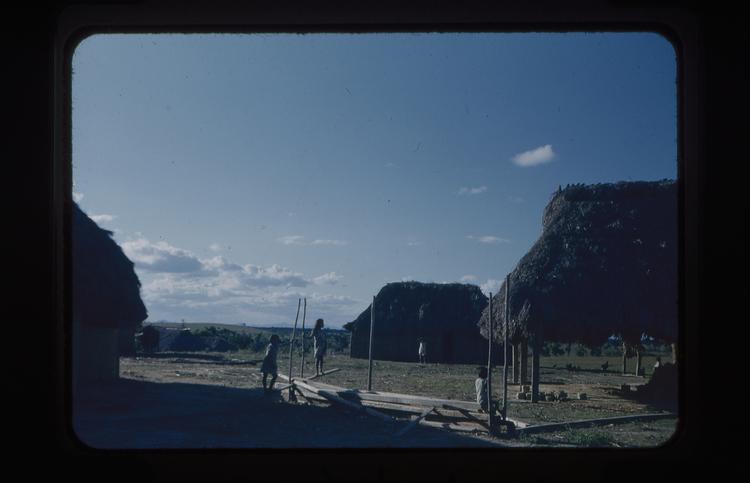 image of Colour slide of buildings with children playing in the foreground