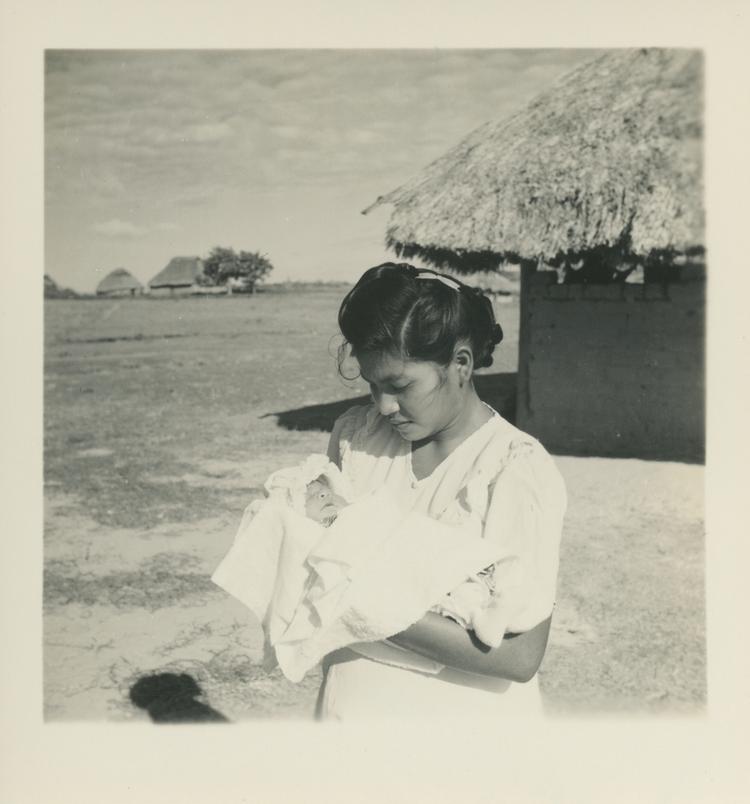 image of Black and white print of woman holding a baby