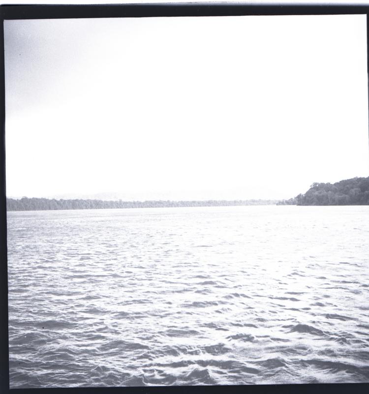 image of Black and white medium format negative of river view - mostly expanse of water
