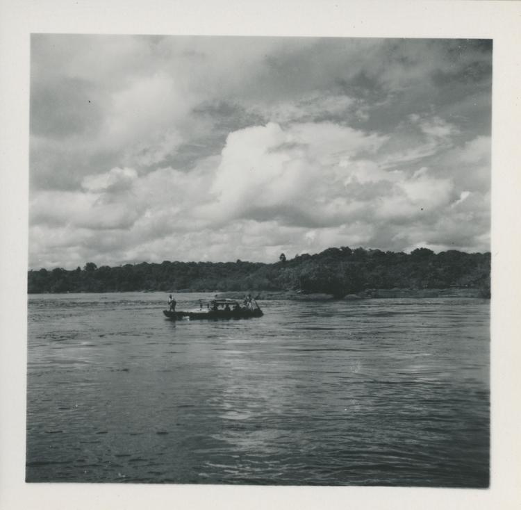 image of Black and white print of boat on wide river