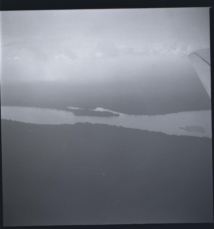 Image of Black and white medium format negative of aerial view of river from plane