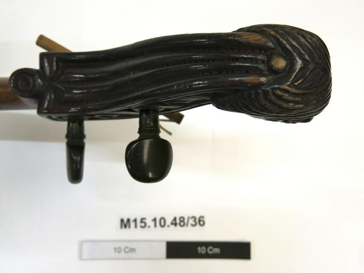 Detail view of headstock of Horniman Museum object no M15.10.48/36