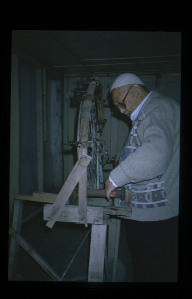 Image of Slide showing the process of silk string manufacture by Rihzhon Khojakhanov and his family