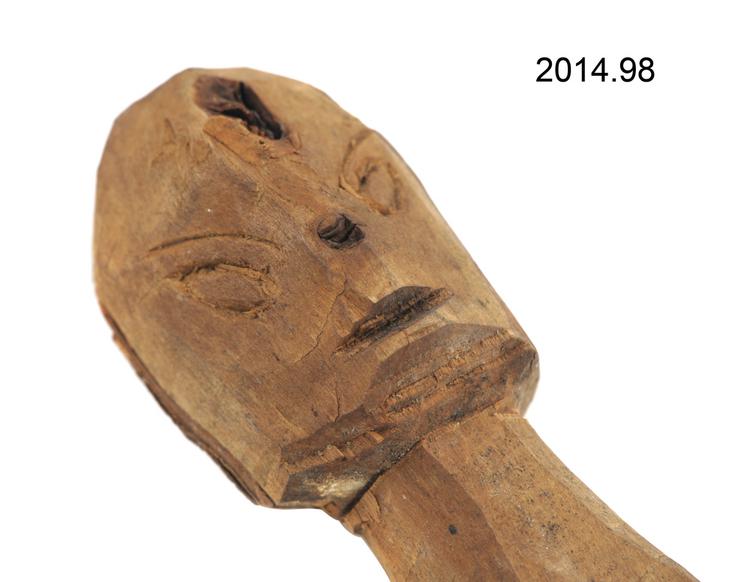 Detail view of carved handle of Horniman Museum object no 2014.98