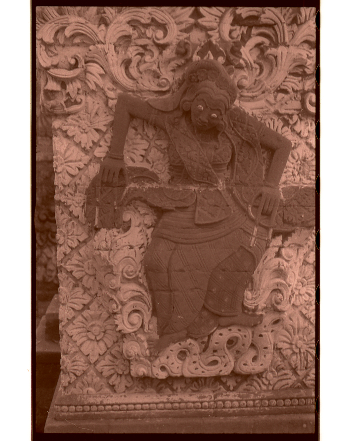 Image of Sculpture of witch in a dance pose in pura dalem, north Bali style