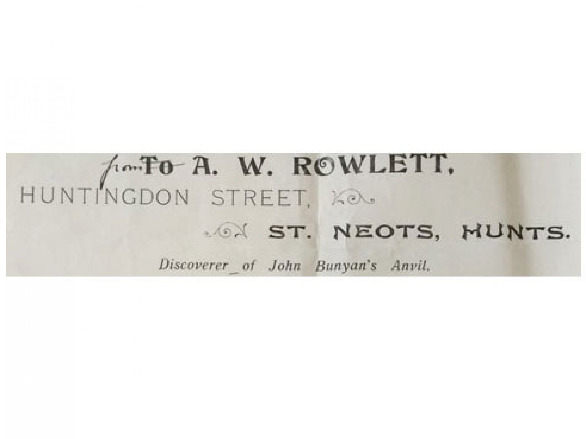 A paper sliver showing the letterhead of a man called AW Rowlett with an address in St Neots