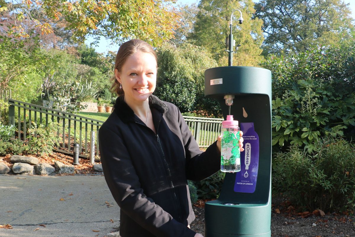 Emma Nicholls filling a water bottle at a drinking fountain