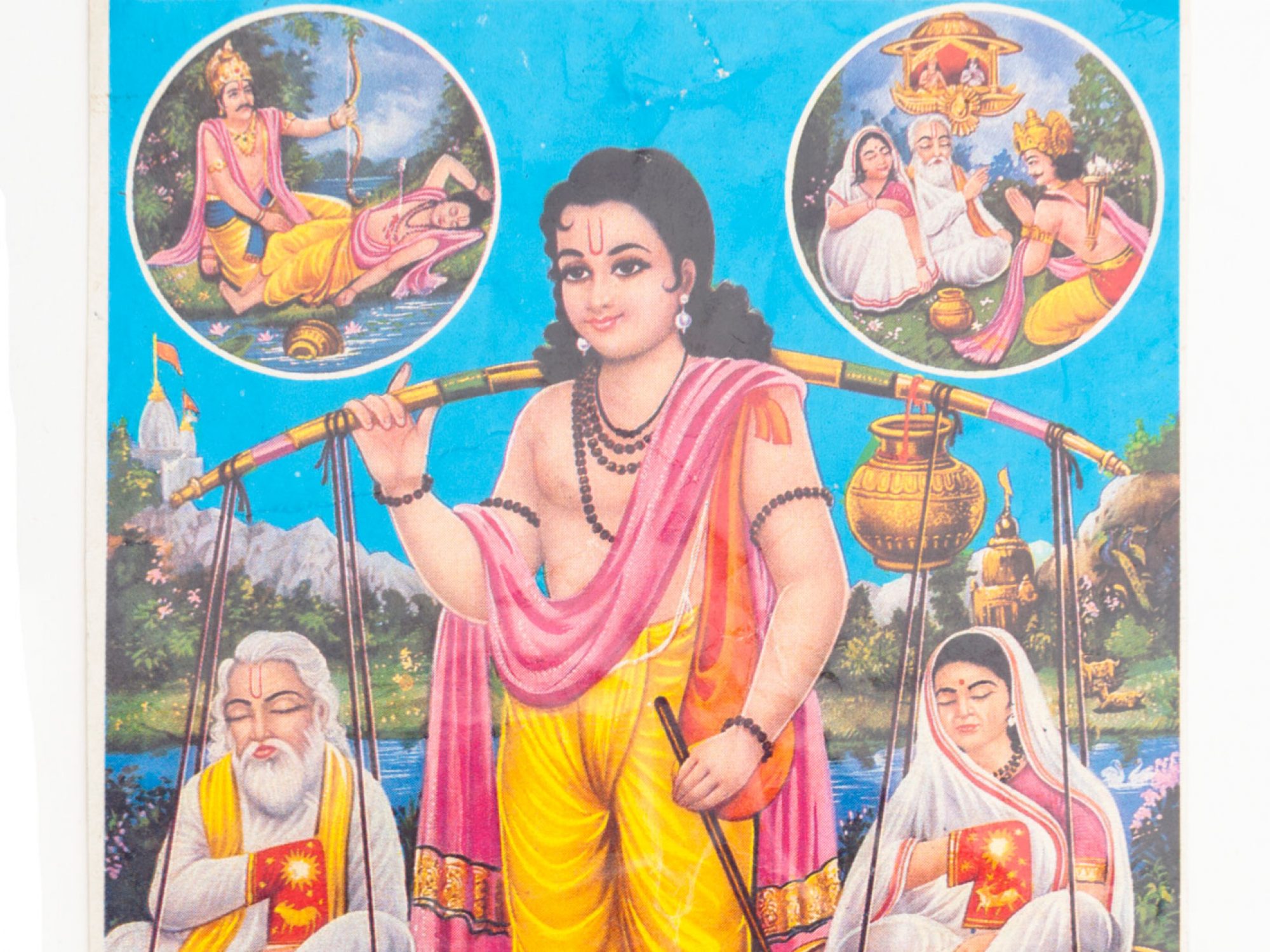 Prayer picture made of paper, entitled Sharwan Kumar. This is a reference to Sharvan Kumar, an ideal son who appears in the Ramayana. Here he is depicted carrying his blind parents on a pilgrimage in two baskets. Above within roundels are depicted later scenes from the story in which King Dasharatha kills Sharwan, having mistaken him for a deer while out hunting, and giving water to Sharwan's two parents as he had requested with his dying breath. Below in two roundels are scenes showing Dasharata's son Rama before he is sent into exile in the forest for fourteen years, and Dasharatha dying of grief for the loss of his son, as Sharwan Kumar's parents had predicted.