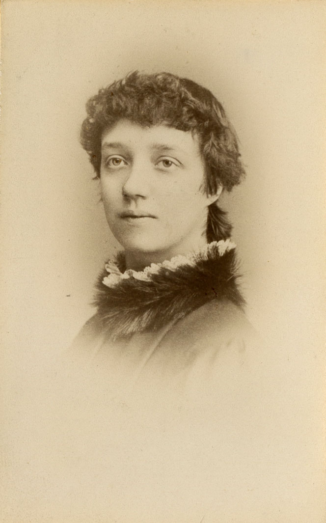 A sepia portrait of a woman's head