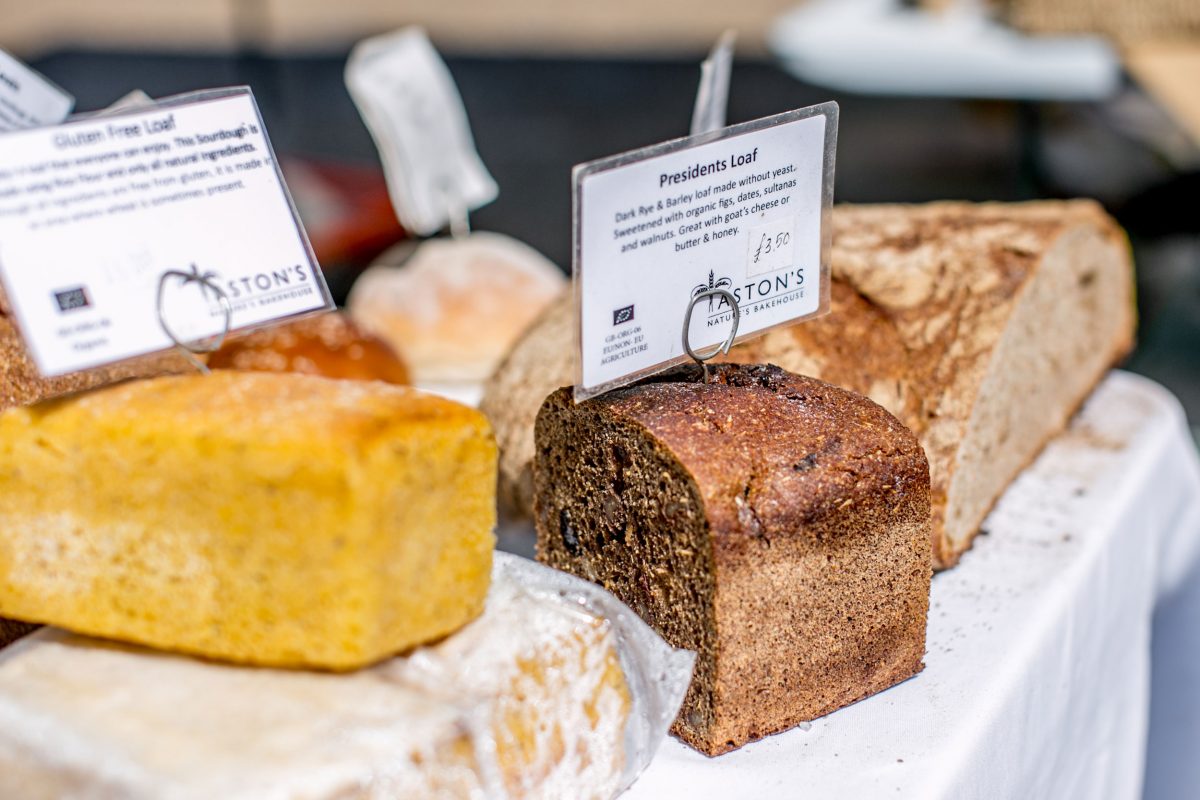 A group of bread loaves on a table,