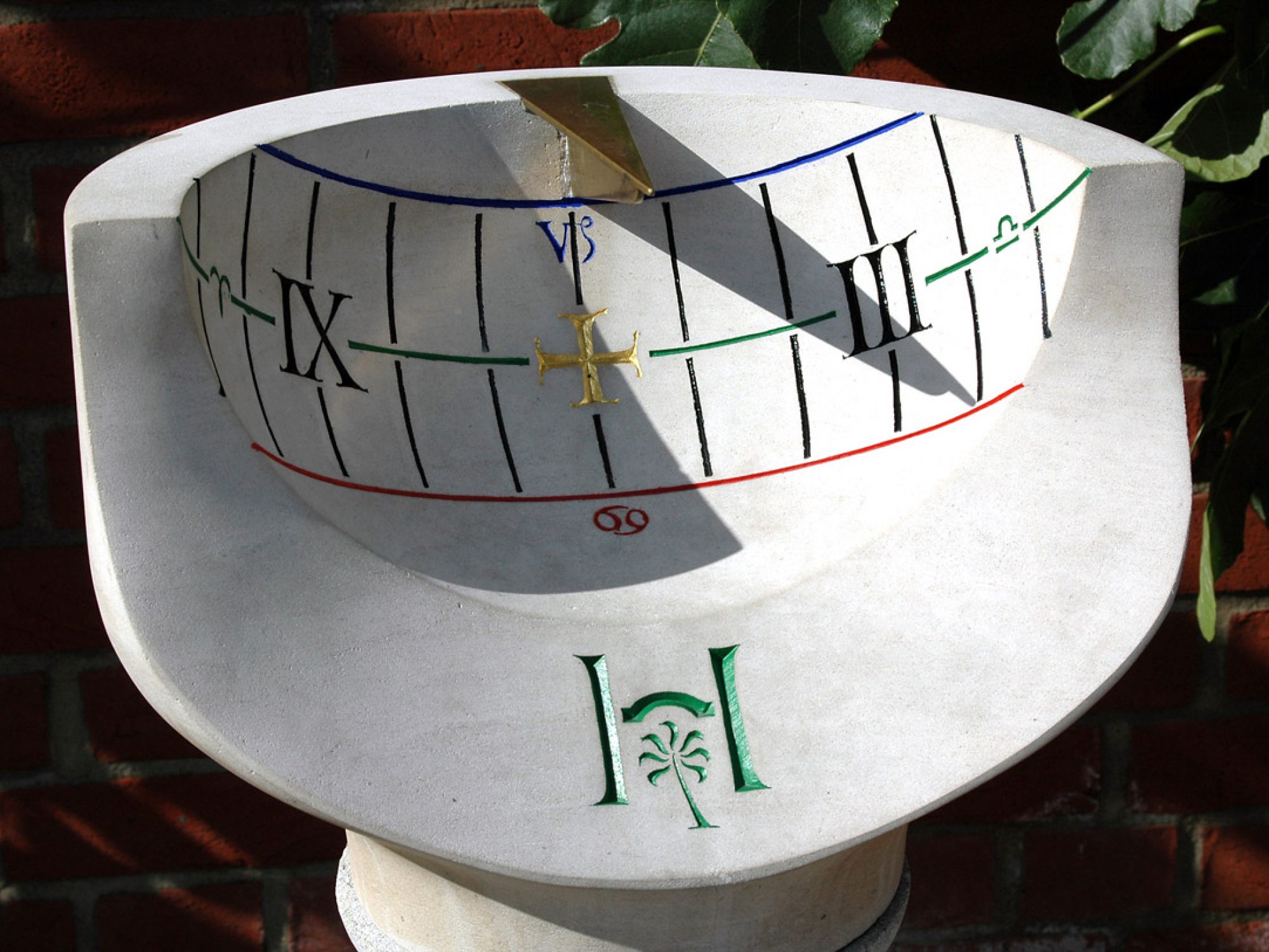 A ceramic sundial close up