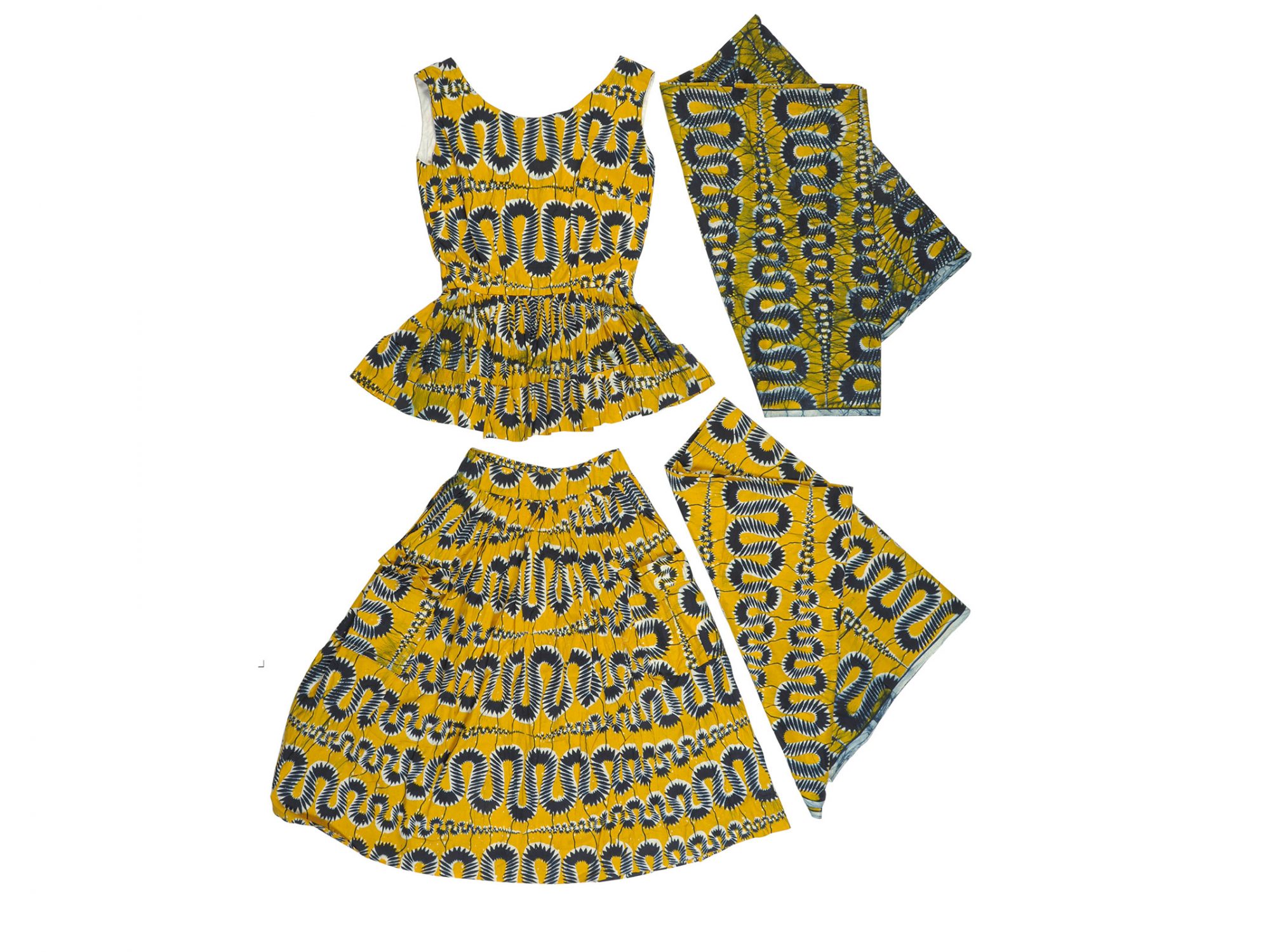 An outfit made from yellow and black printed fabric laid flat on a white background. There are four pieces: a sleeveless top, a skirt and two side swatches of fabric.