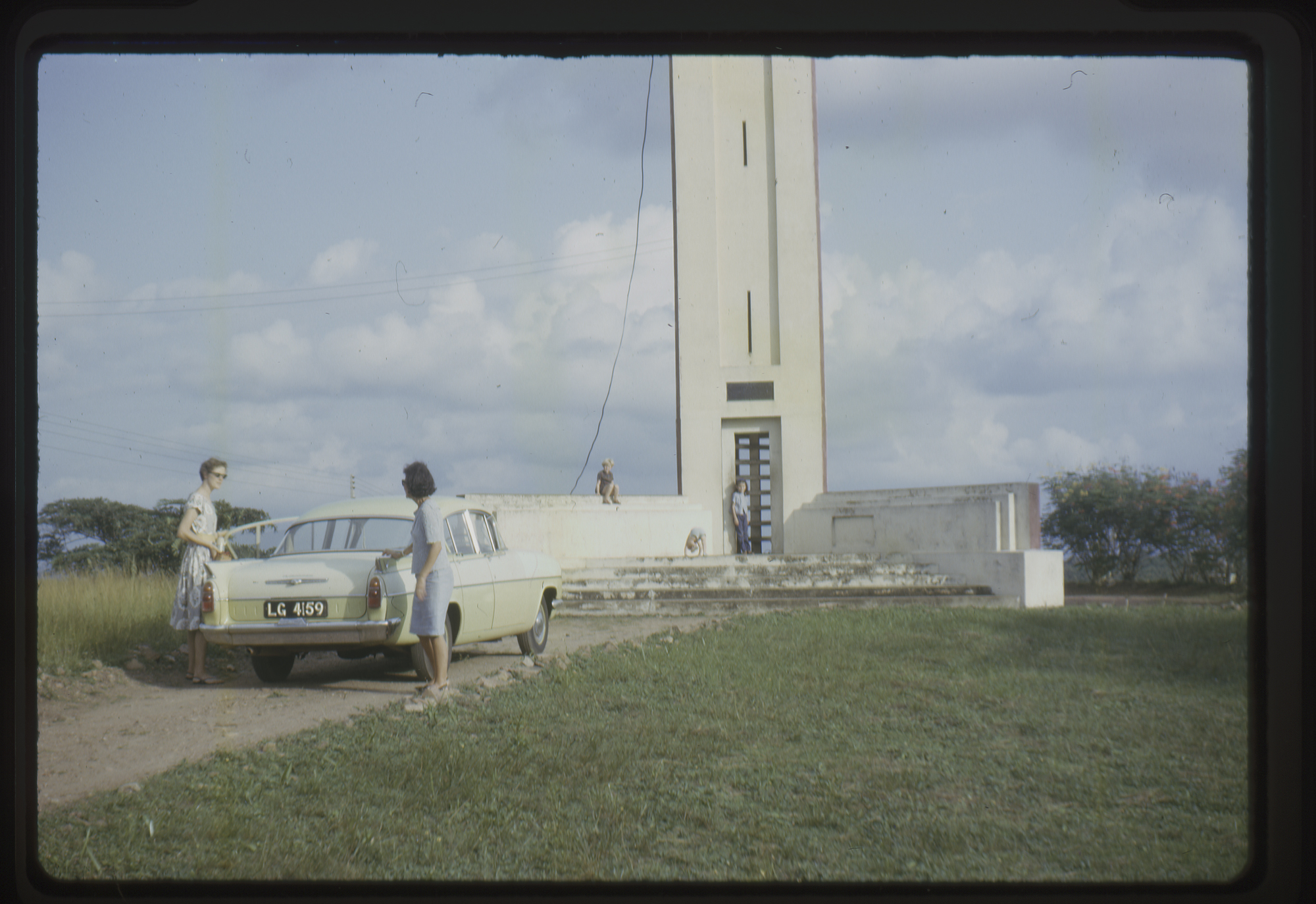 People at viewing platform on top of the hill