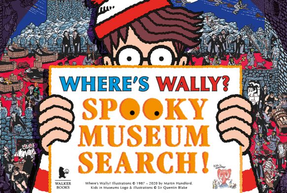 Cartoon of man holding up sign that reads, Wheres Wally? Spooky Museum Search!
