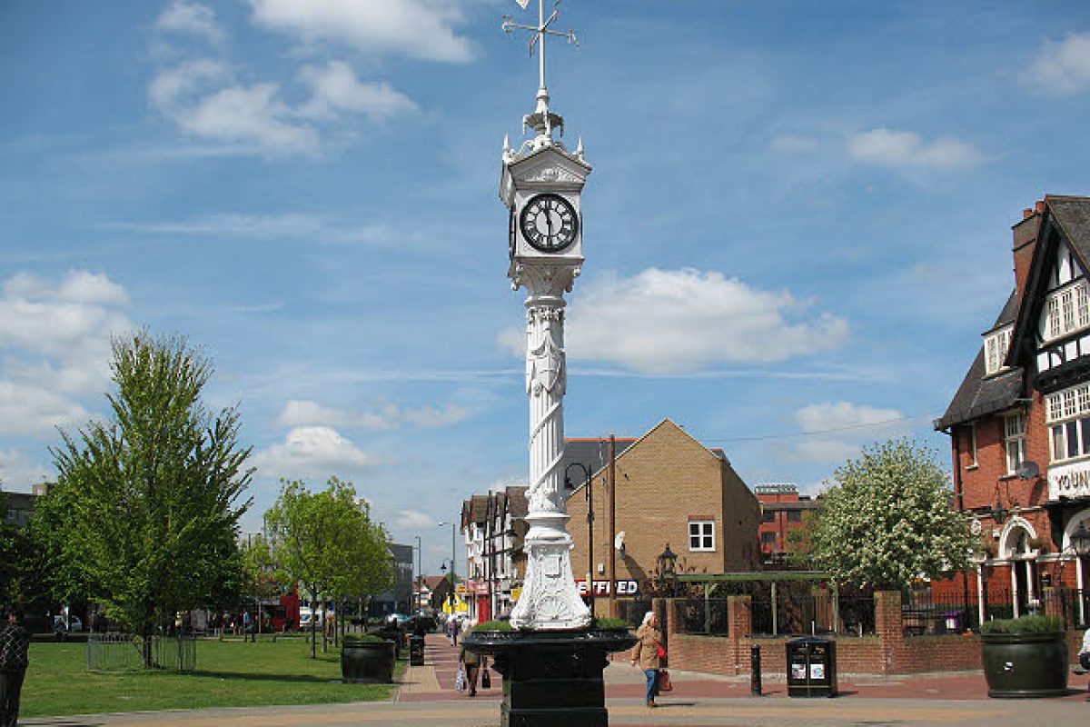 A white metal clock tower