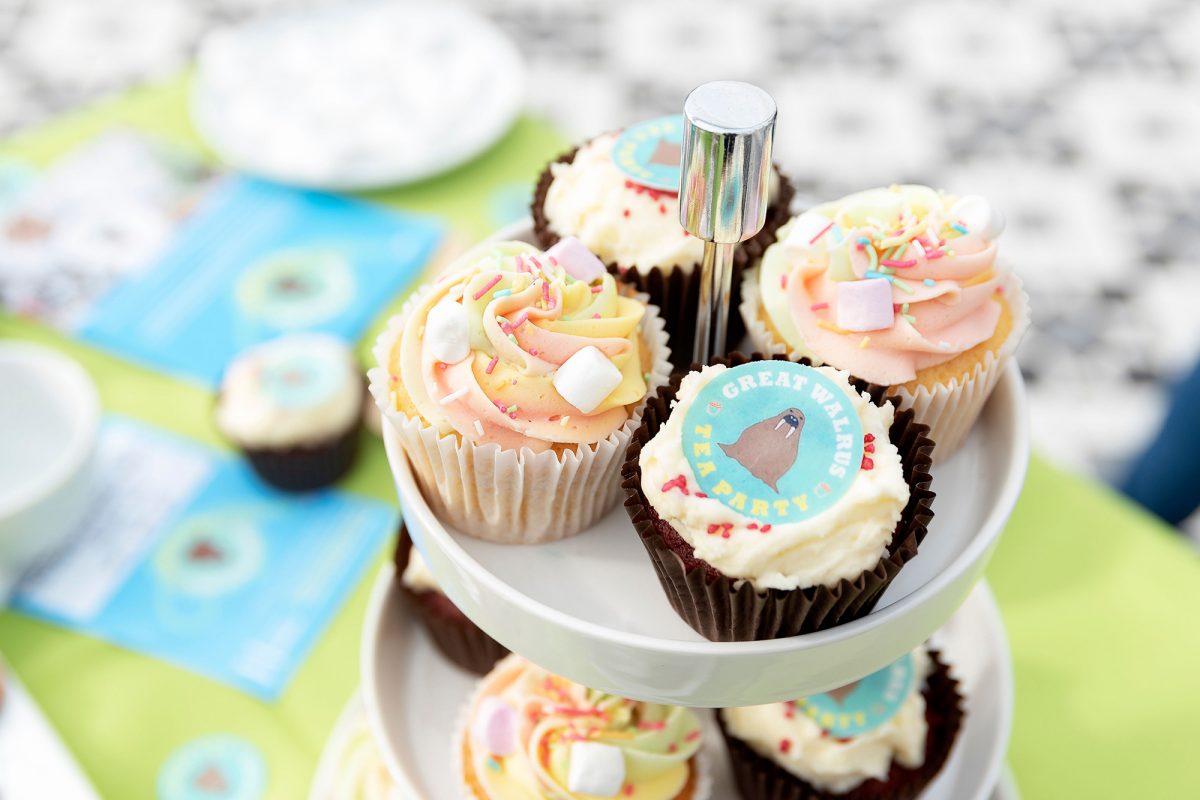 colourful cupcakes on cake stand.