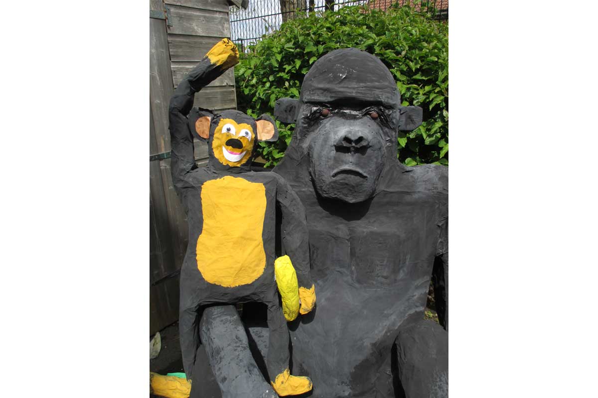 Monkey and Gorilla artworks next to each other