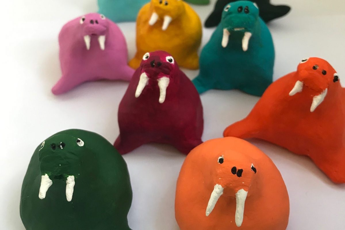 Colourful clay walrus models