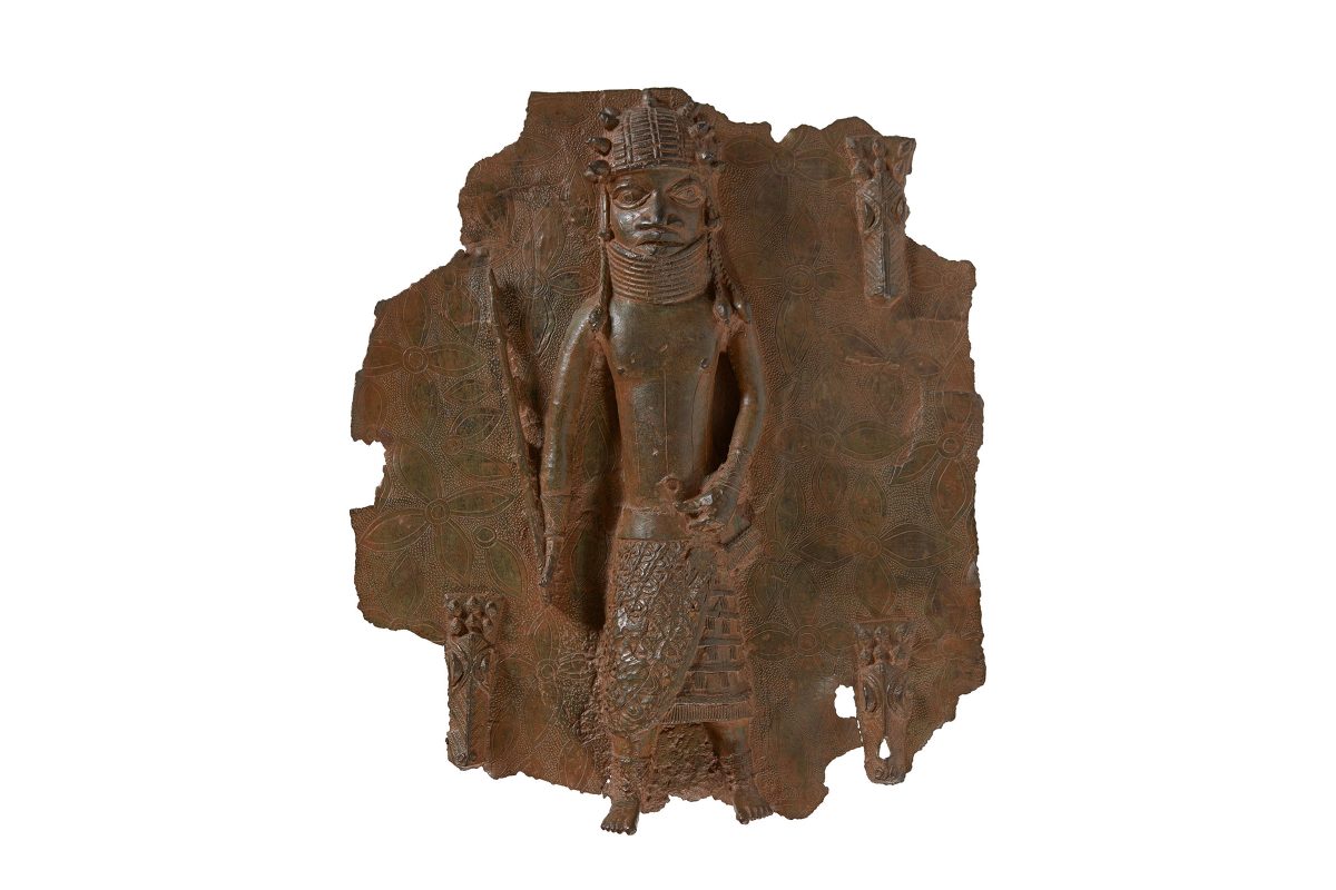 Bronze plaque depicting Oba Orhogbua holding a staff, representing authority and power