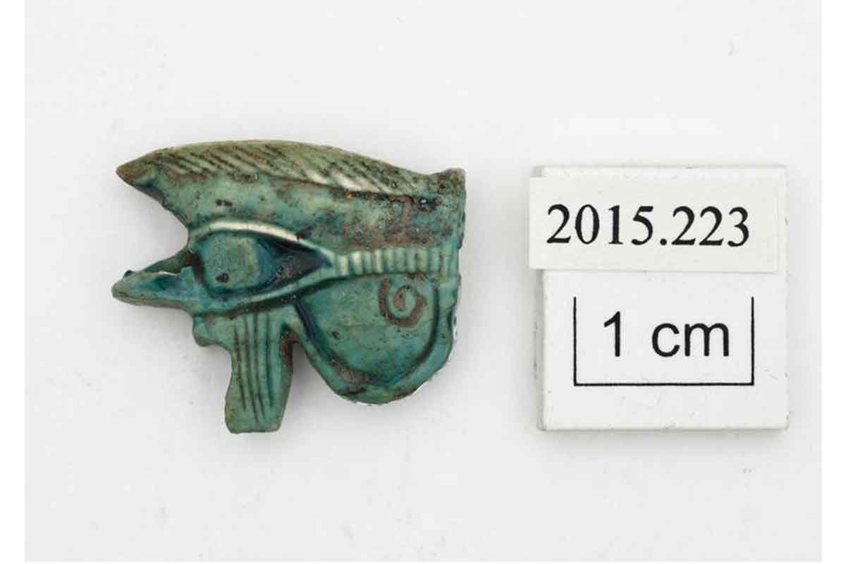 Green wadjet eye, Eye of Horus, with incised decoration on both sides